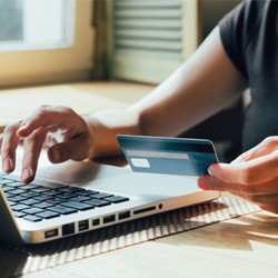 Woman using credit card