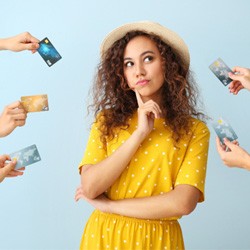 Woman surrounded by credit cards