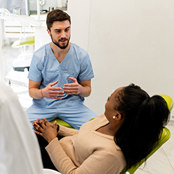 woman at consultation with dentist