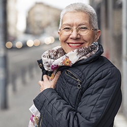 Woman smiling with dental implants in Assonet