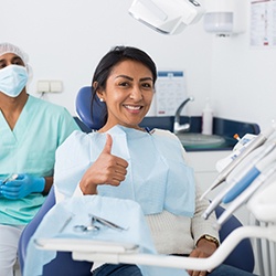 woman receiving dental implant care in Assonet