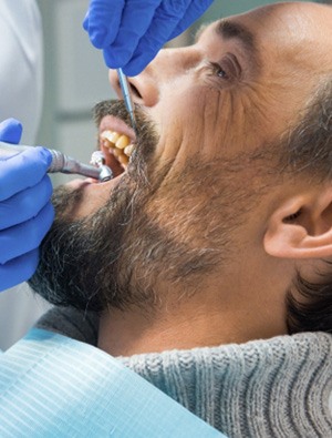 Man undergoing dental cleaning