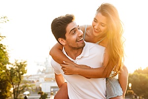 smiling couple in sun