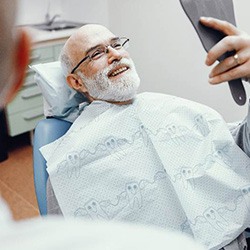 Man smiling after root canal therapy in Assonet