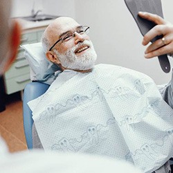 Man smiling after root canal therapy in Assonet