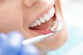 Female patient getting a dental exam