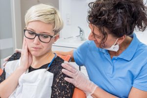 woman with facial pain